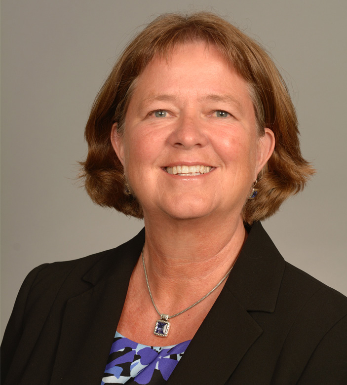 Headshot photo of Dr. Barb Glenn, smiling
